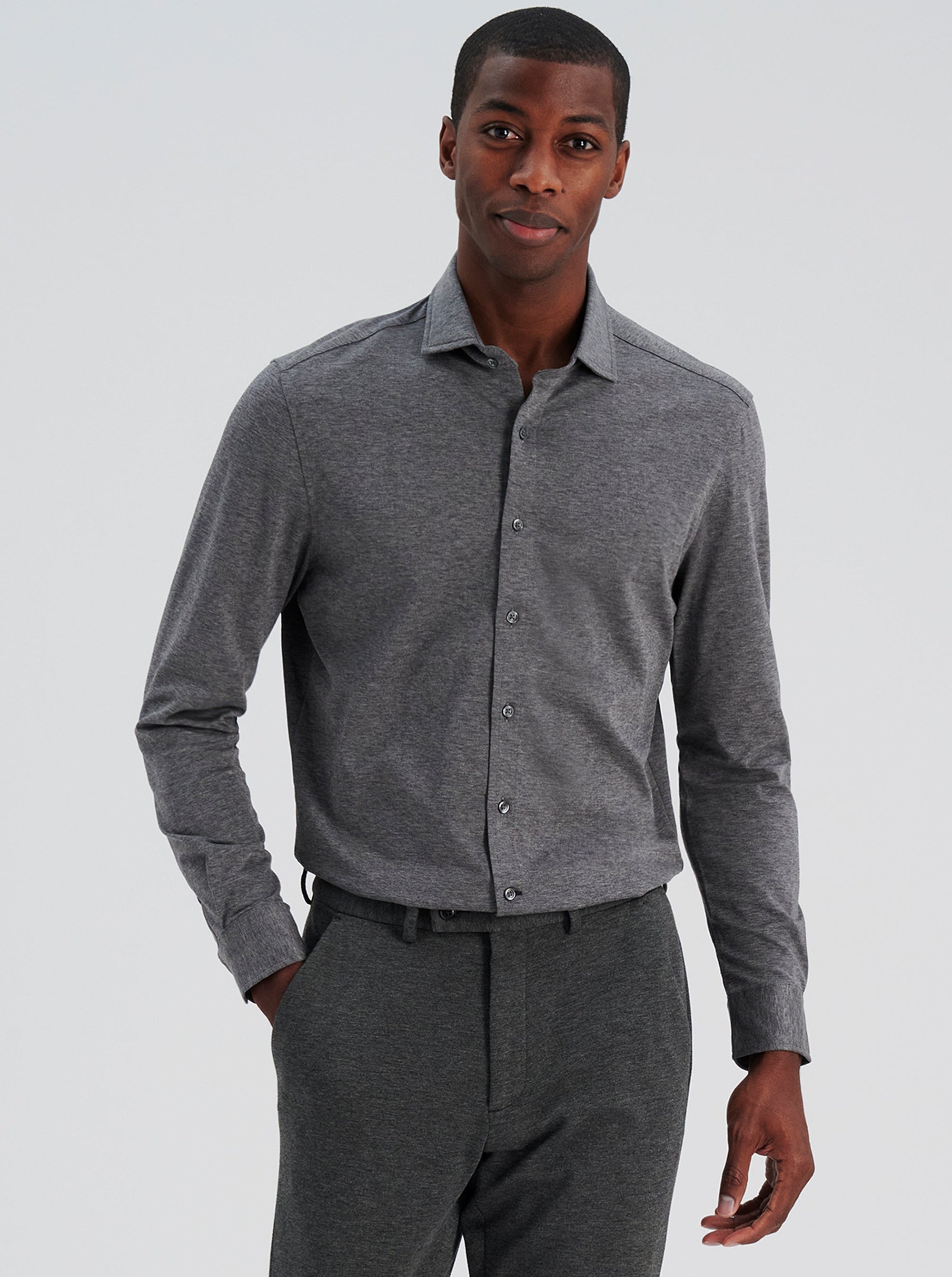 Man wearing the NICESTUFF Lexington knit button-down in grey mélange, full look